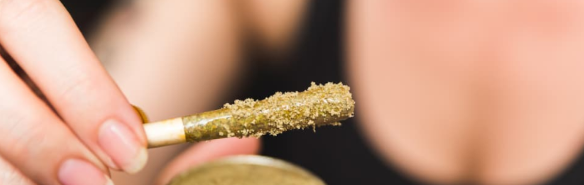 woman in black twaxing with kief