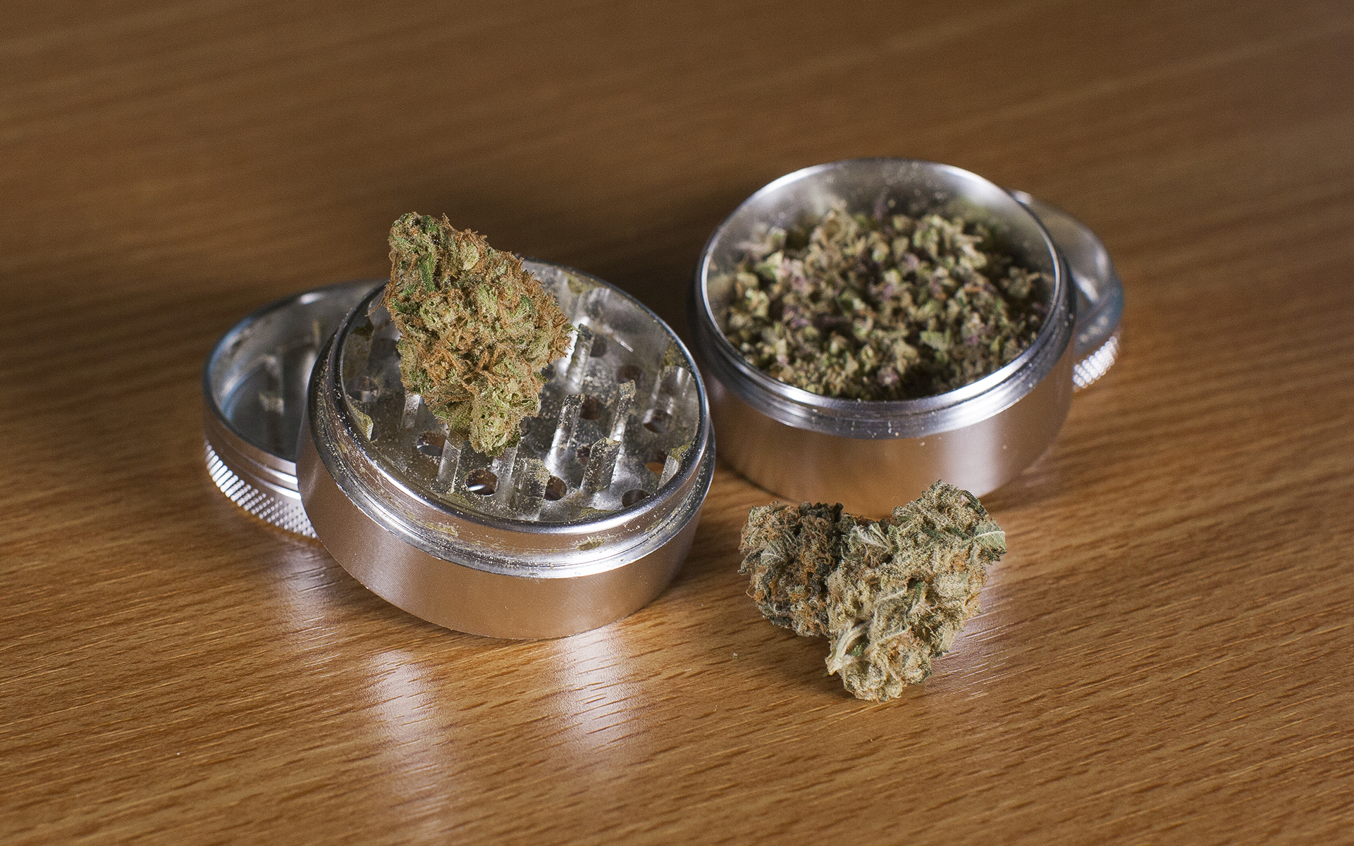 two grinders with cannabis 